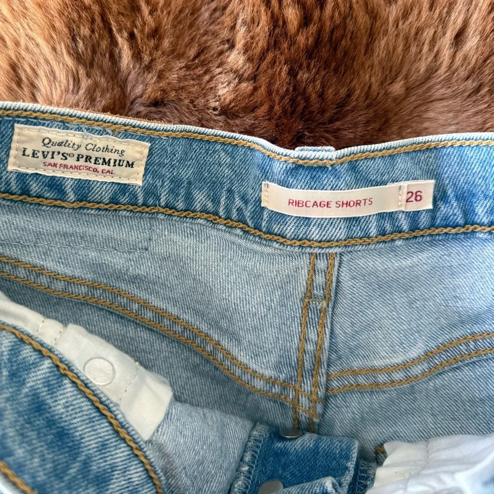 Levi’s distressed rib cage denim shorts